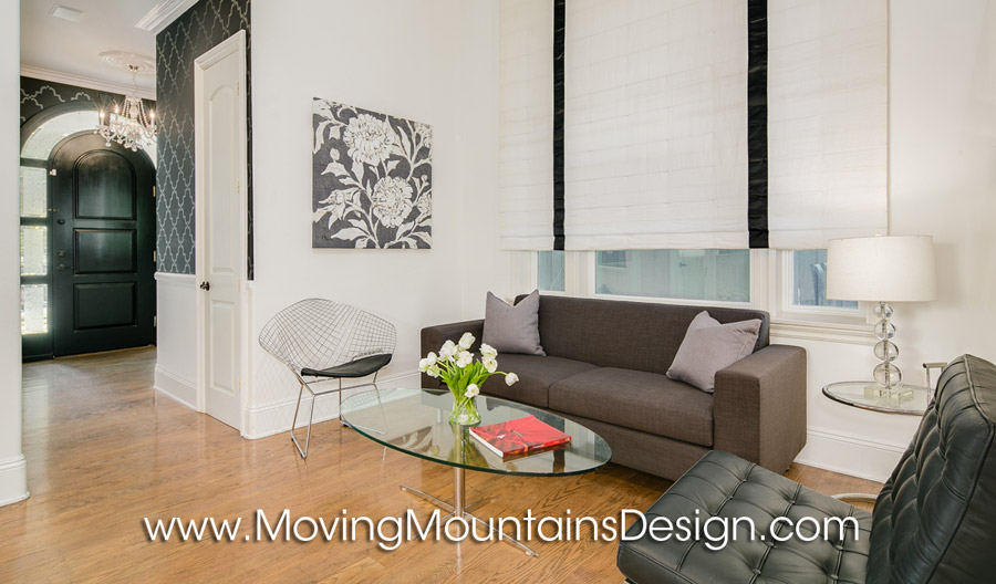 Modern living room home staging gray glass and chrome