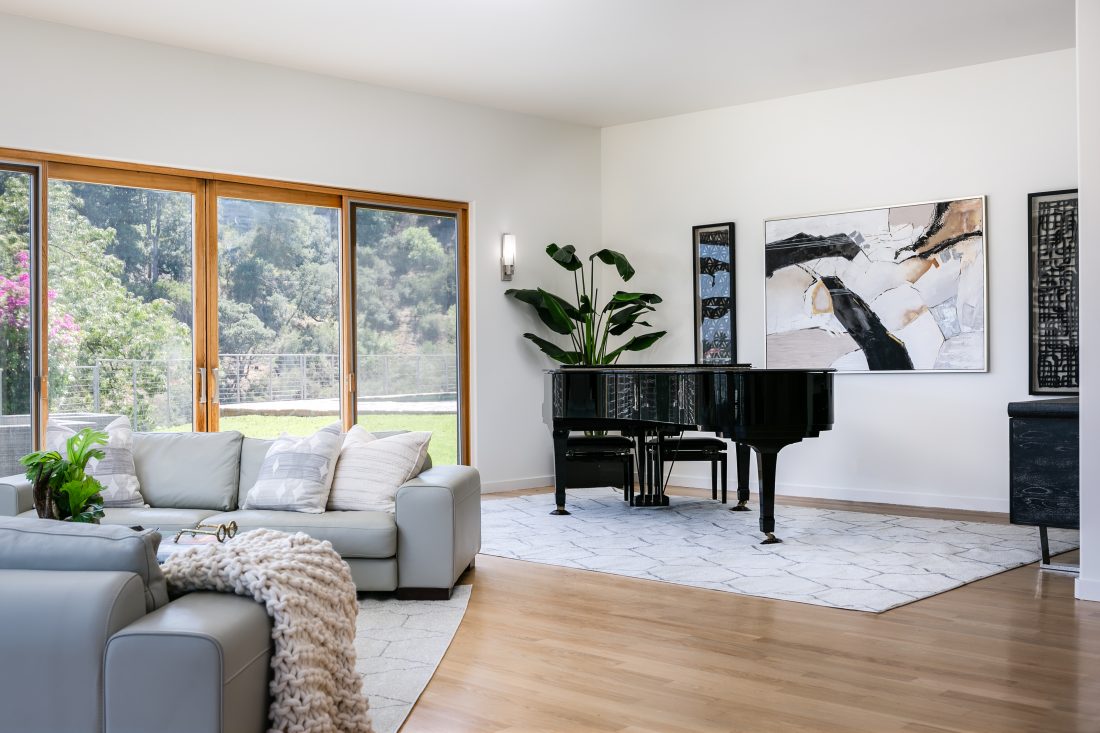 Contemporary home staging with baby grand piano