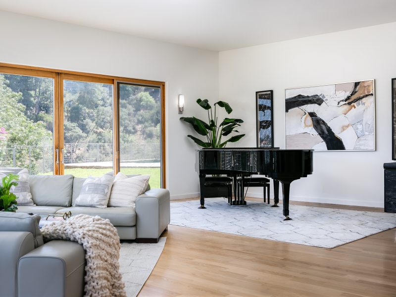 Contemporary home staging with baby grand piano